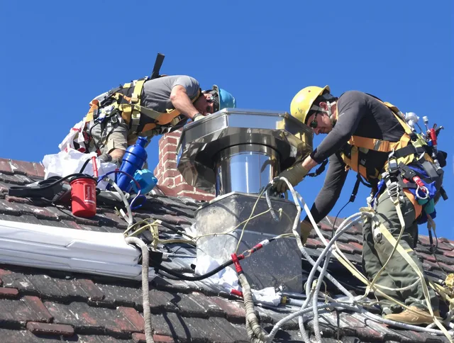 Protective chimney cap installed by Port Chester Chimney Sweep in Port Chester, NY
